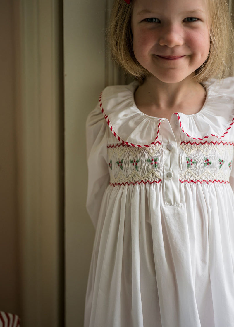 Samantha Varvel x Smock London Nightingale Girls Dress Moonstone White with Candy Cane Trim and Holly Hand Smocking