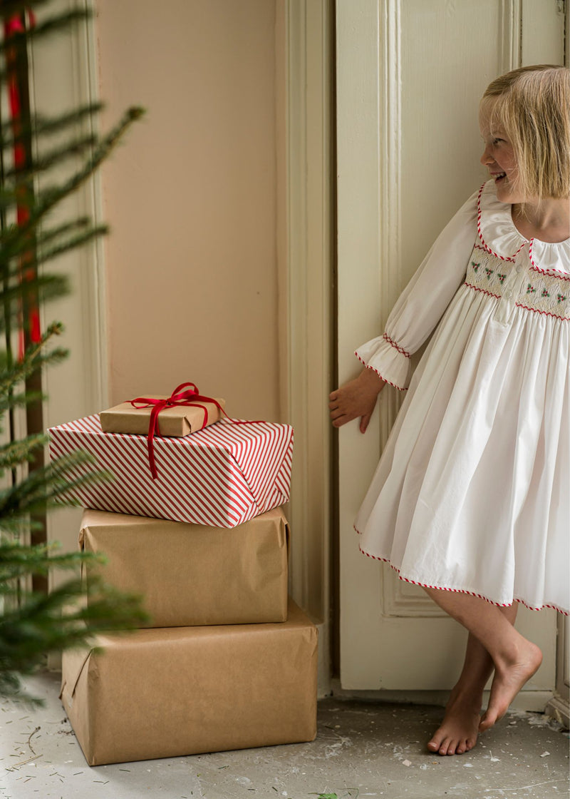 Samantha Varvel x Smock London Nightingale Girls Dress Moonstone White with Candy Cane Trim and Holly Hand Smocking