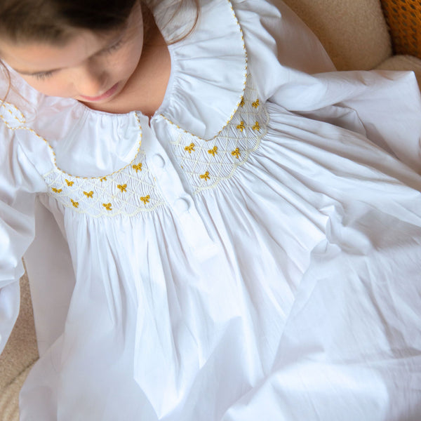 Memo Press x Smock London Nightingale Girls Dress Moonstone with Gold Bows Hand Smocking